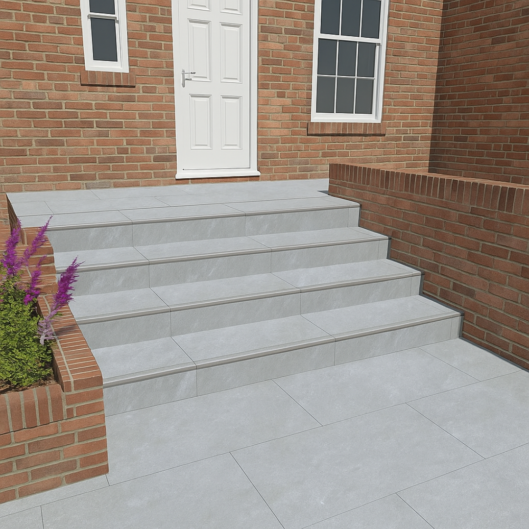 Multi-level garden steps featuring Kandla Grey porcelain bullnose treads with anti-slip grooves and matching risers.